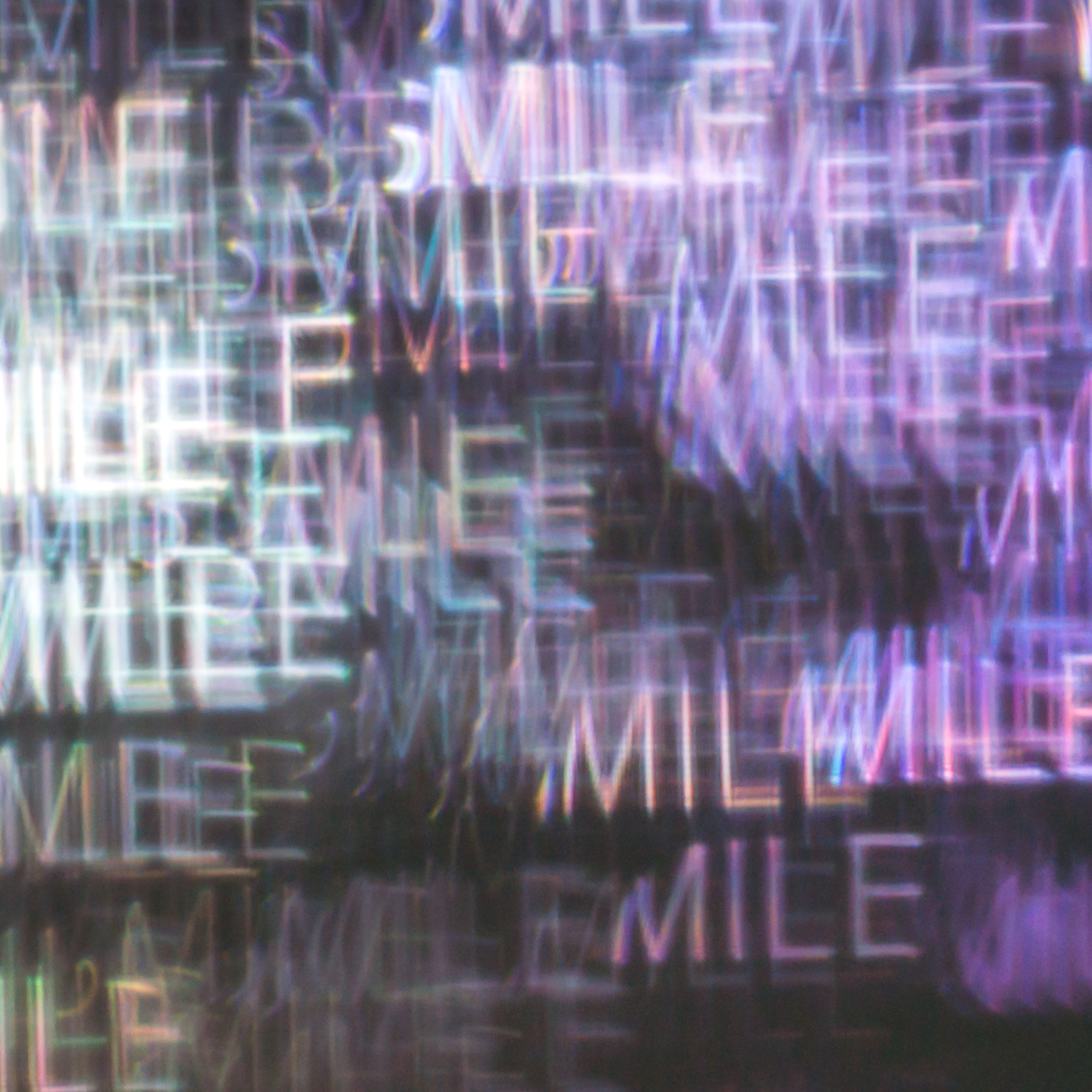 Abstract, blurry overlapping images of the word "smile" in shades of white and purple.